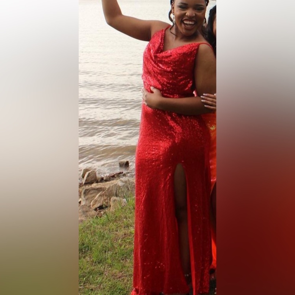 Beautiful, red unique prom dress with front slit fully sequin